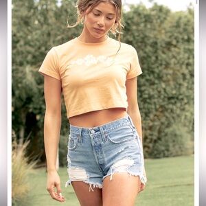 Levi's High Rise Button Fly 501 Cut Off Shorts in Distressed Wash Size 28